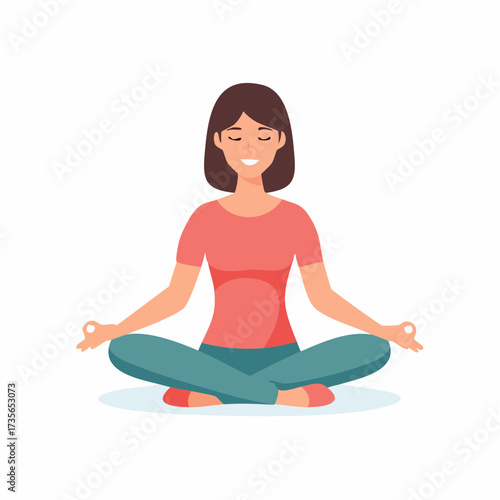 Woman meditating in lotus position with eyes closed and a serene expression.
