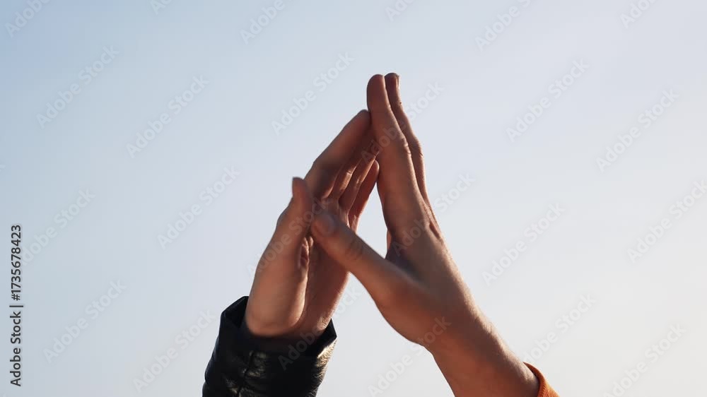 Hands touch in greeting and connection showing two hand meeting against ...