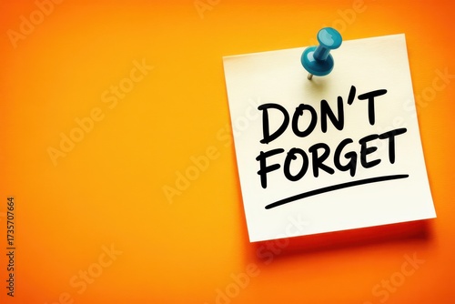 A bright orange background with a yellow sticky note and a blue push pin, featuring the handwritten reminder 'Don't Forget' for important tasks and appointments