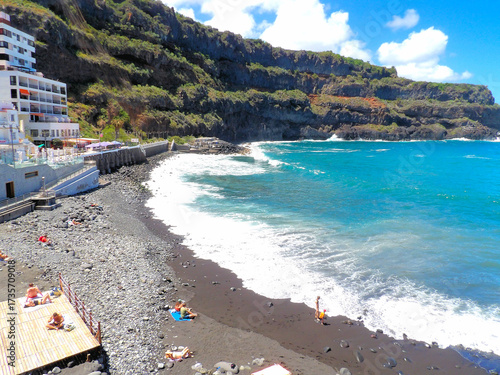 Tenerife landscapes, picturesque coastline, ocean waves at sunset