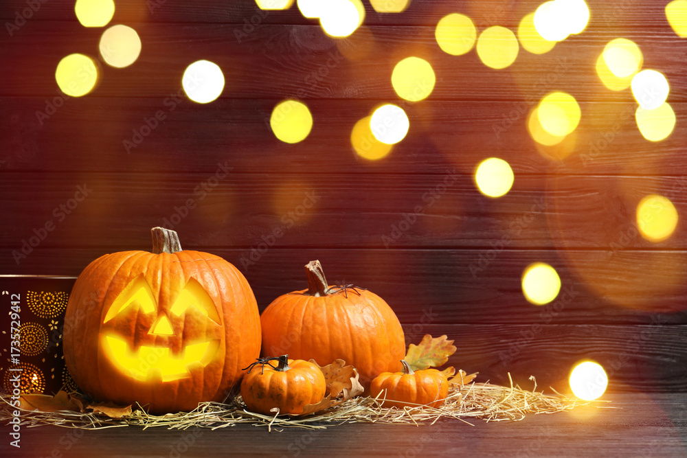 Obraz premium Halloween jack-o-lantern. Pumpkin with carved creepy face, bokeh effect