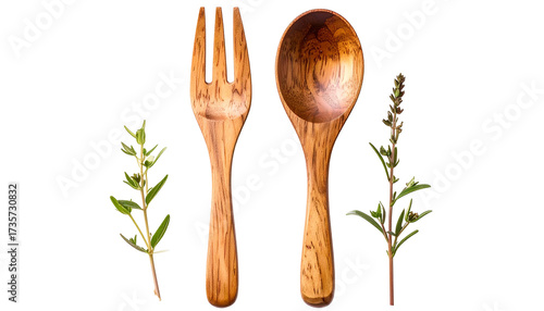 Wooden cutlery with herbs on black