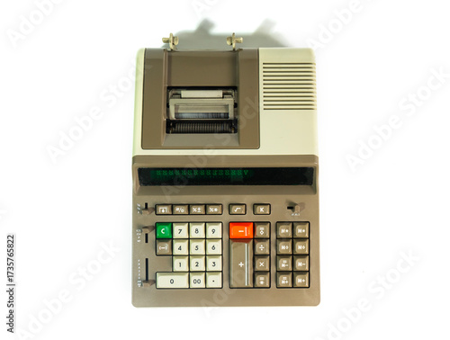 A vintage electronic printing calculator from the 1970s or 1980s, isolated on a white background. This retro office machine is a symbol of old technology from before the computer age.
