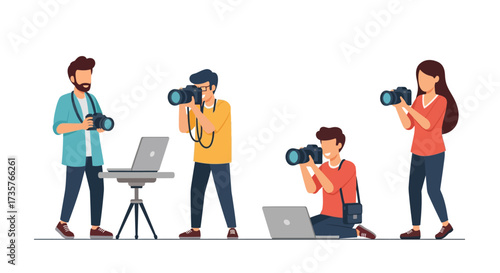 Group of four photographers with cameras, one with a laptop on a tripod, capturing images in a studio setting.