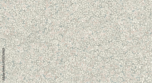 A fine-grained textured surface with a speckled light gray and white pattern creating a subtle and neutral background.