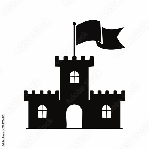 Silhouette of a castle with a flag waving in the wind.