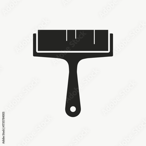 Construction tool represented by black paint roller on light background. Paint roller depicts building work and home renovation. Construction tool also signifies a painting roller,