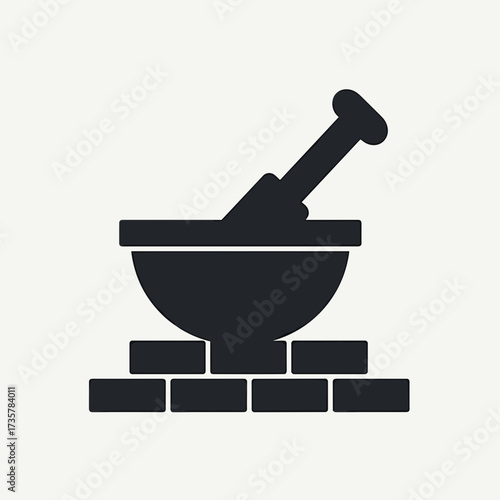 Mortar and pestle set on brickwork surface for construction work concept. Depiction mortar and pestle for grinding materials, with brickwork adding a robust foundation.