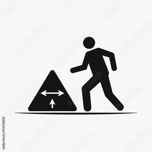 Construction work zone ahead with a pedestrian silhouette approaching warning sign. Construction work alerts pedestrians to avoid unsafe terrain, watch your step, and be careful.