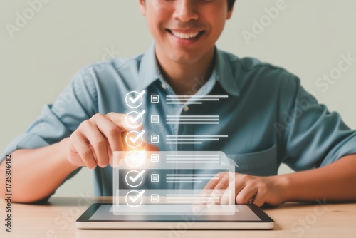 A smiling man uses a tablet to interact with a futuristic digital checklist, symbolizing project completion, task management, and satisfaction