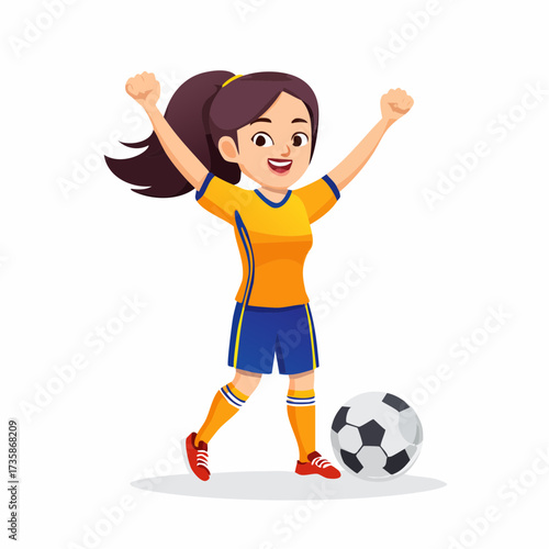 A happy young woman in a soccer uniform celebrates with her arms raised next to a soccer ball.