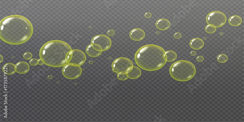 Brightly transparent soap bubbles float gently on a clear green background