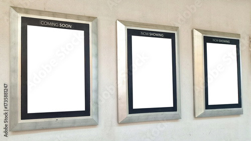 Three Mock up poster frames on Cinema wall