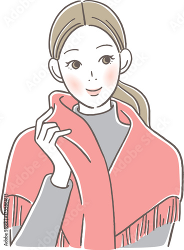 ストールを肩に掛ける女性