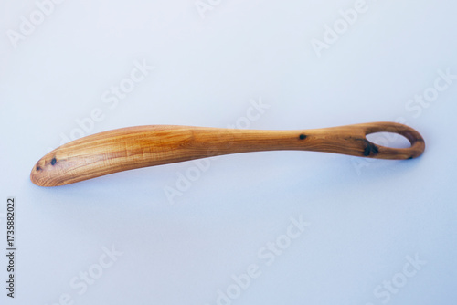 Wooden kitchen utensils stacked view close up isolated