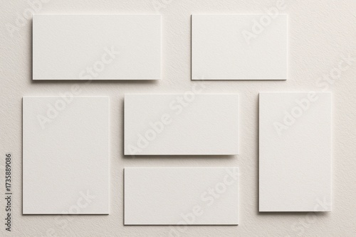 Wallpaper Mural Blank business cards arranged on light textured background, mockup for design and branding. Torontodigital.ca