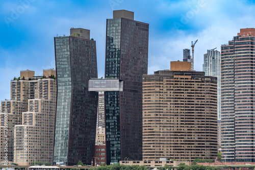 Curved skyscrapers and modern high-rises along the East River in Manhattan, New York.