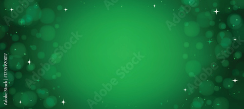 Festive green Christmas background with glowing bokeh lights and sparkling stars.
