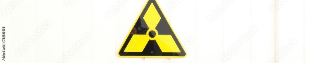 Obraz premium Black and yellow radioactive warning symbol, isolated on white , label, hazard