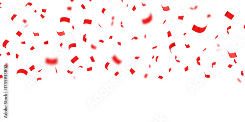 Red confetti floating on white background