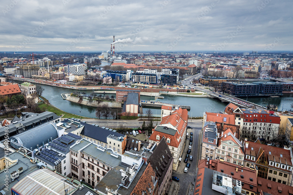 Obraz premium Buildings over Oder river seen from tower of St Elisabeth Church in historic part of Wroclaw, Poland