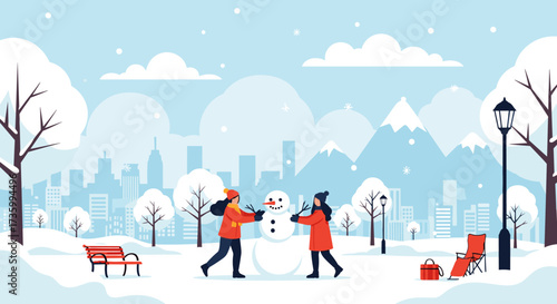 Two friends happily build a snowman together in a snowy park with a city skyline in the background.
