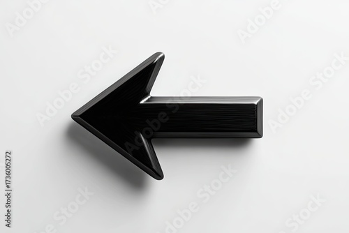 Black, 3D arrow pointing left against a plain white background