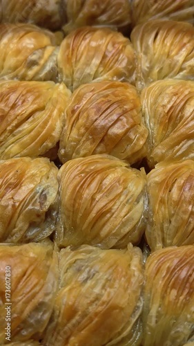 Baklava, dessert made from syrup and honey. Oriental sweets on showcase in assortment. 