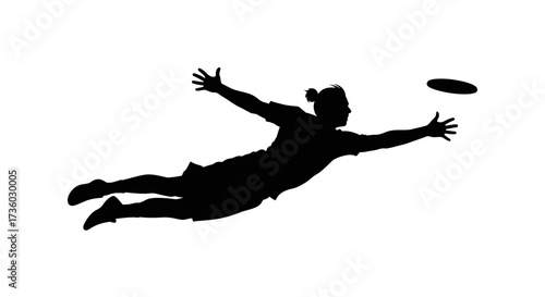 Dynamic silhouette of athlete diving to catch flying disc during intense game with focused energy