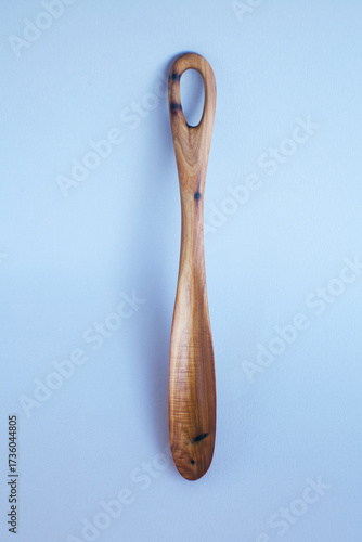 Wooden kitchen utensils stacked view close up isolated