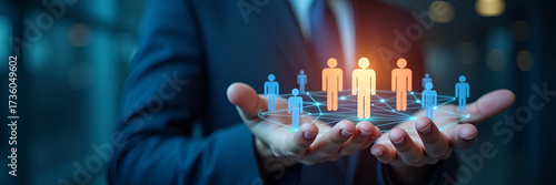 A dynamic representation of a holographic network interconnecting employee icons, illustrating team management concepts. The composition has strategic copy space for added messaging.