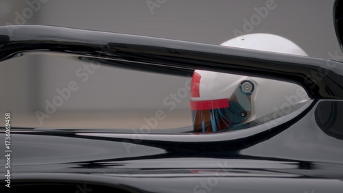 A fast racing car stands on the starting grid before the race