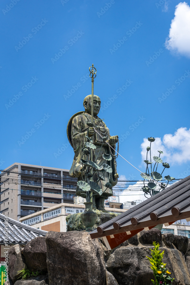 Fototapeta premium Statue of monk Kukai at Shitenno-ji Temple in Osaka, Japan