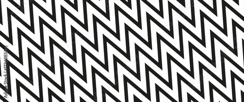 Black and white diagonal contrasting stripes with a zigzag on all sheet .