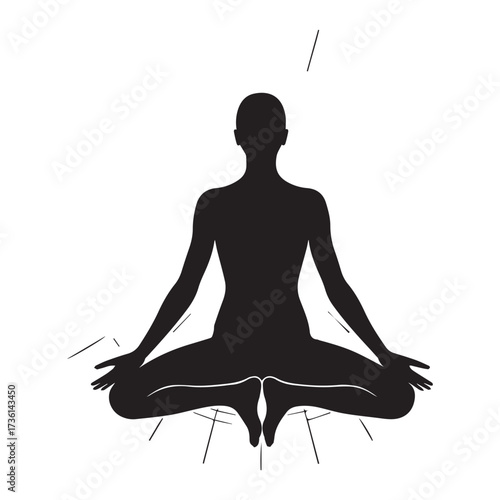 Silhouette of a person meditating in lotus pose yoga