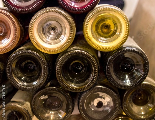 Wine Bottles Stacked in a Cellar.