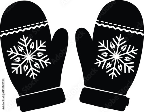 Winter mittens with snowflake design in black and white