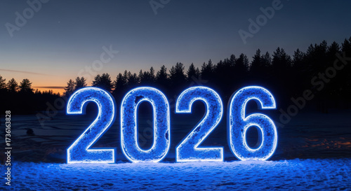 Wallpaper Mural Bright blue neon numbers 2026 illuminated in snowy landscape at dusk Torontodigital.ca