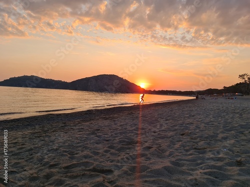 Panorama of an amazing sunset over the sea off the coast of Palinuro, province of Salerno in the Campania region of southwestern Italy, part of the Cilento traditional area