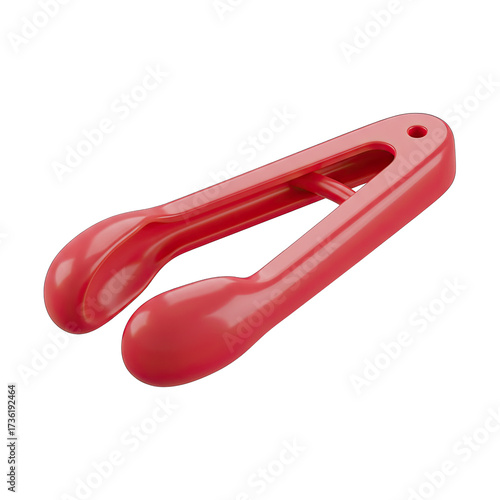 A bright red plastic food tong, ideal for serving various dishes like salads or pastries, is isolated on a crisp white background, showcasing its essential kitchen utility.