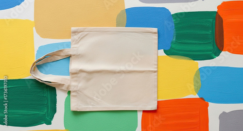 Showcase your brand with this reusable canvas tote bag on colorful paint swatches