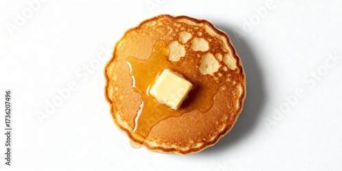 Wallpaper Mural Overhead shot of a single pancake with melting butter forming island patterns on white background Torontodigital.ca