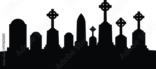 Silhouette of Various Tombstones and Monuments in a Cemetery Landscape graveyard