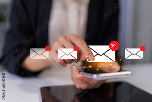 Professional manages abundant email messages notifications smartphone displaying high volume communication from digital inbox daily work