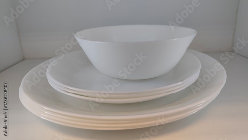 stack of white bowls