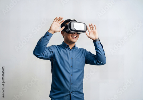 Young Man Immersed in Virtual Reality Experience with VR Headset