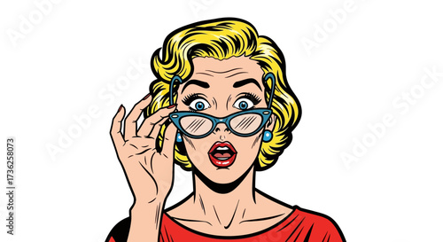 A blonde woman in a red shirt, wearing glasses, expresses surprise with wide eyes and an open mouth.