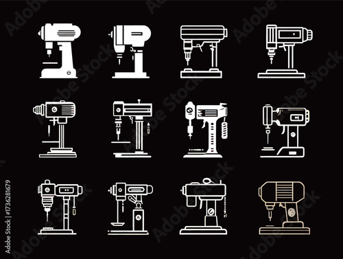 Several vintage sewing machines are creatively arranged against a dark background, showcasing their unique designs and styles.