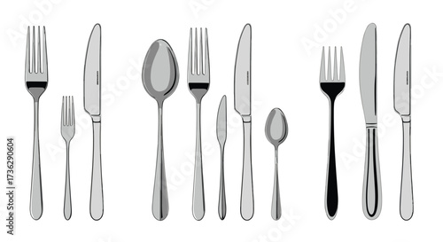 A collection of various silverware items including forks spoons and knives.