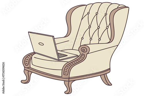 A laptop on a plush armchair